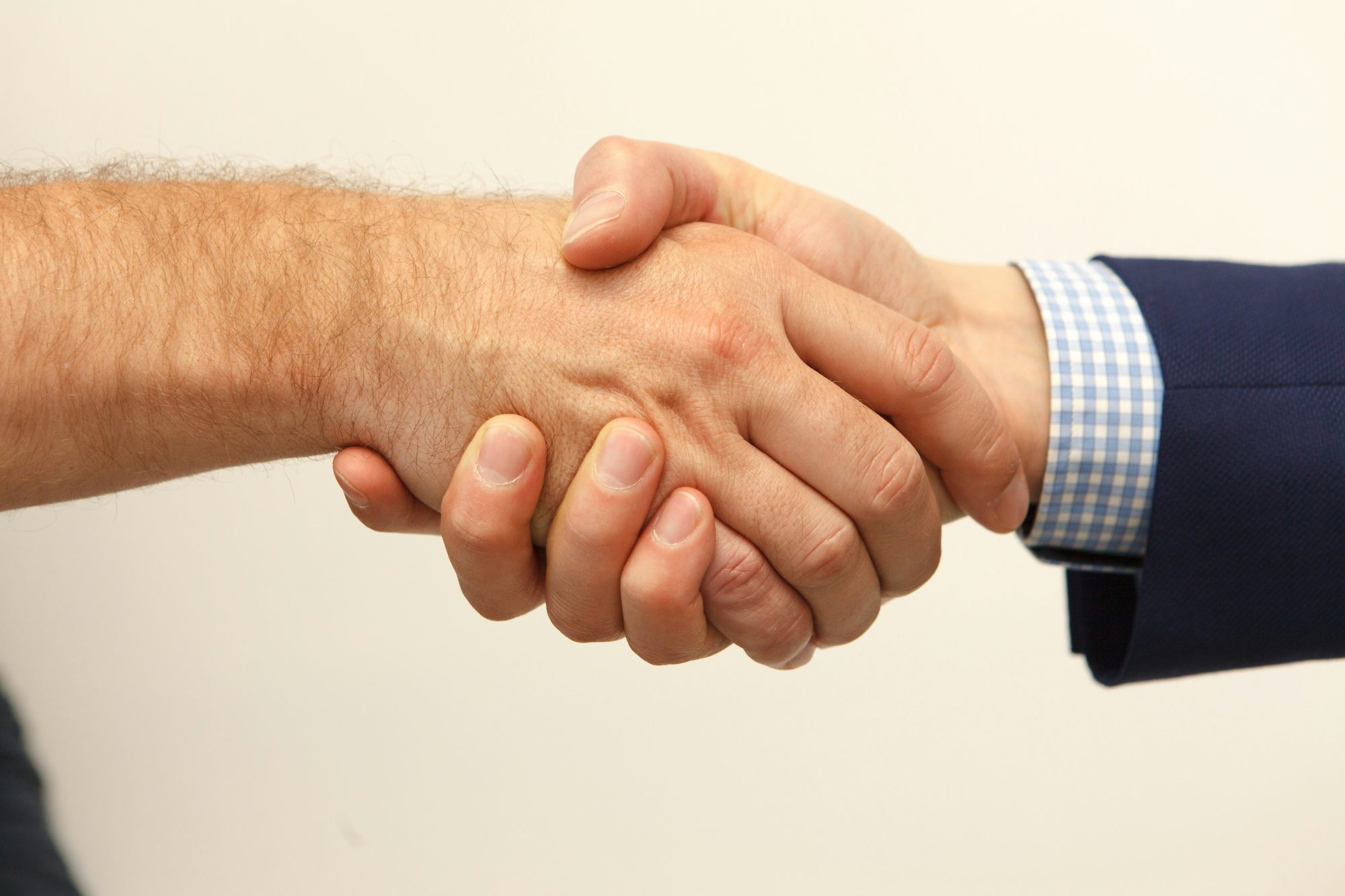 Handshake Between Two People - Cannabis Growing Consultants