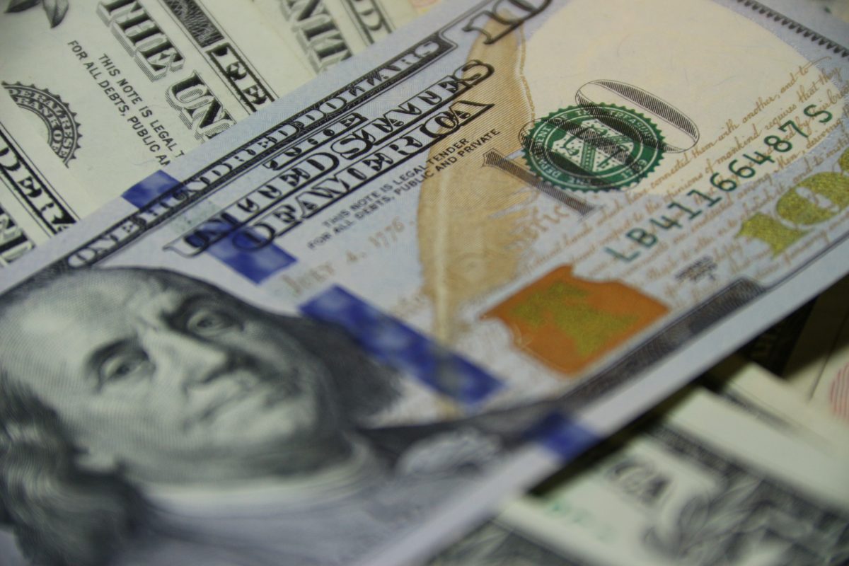 a closeup of US dollar bills - Cannabis Startup Funding