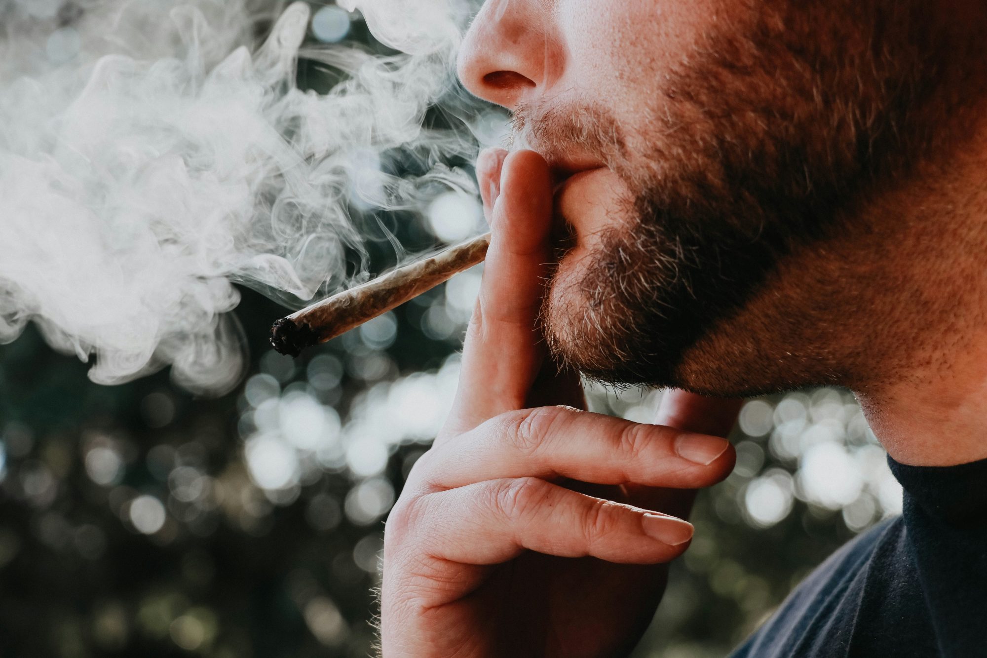 Man Smoking Joint - Cannabis Club Malta