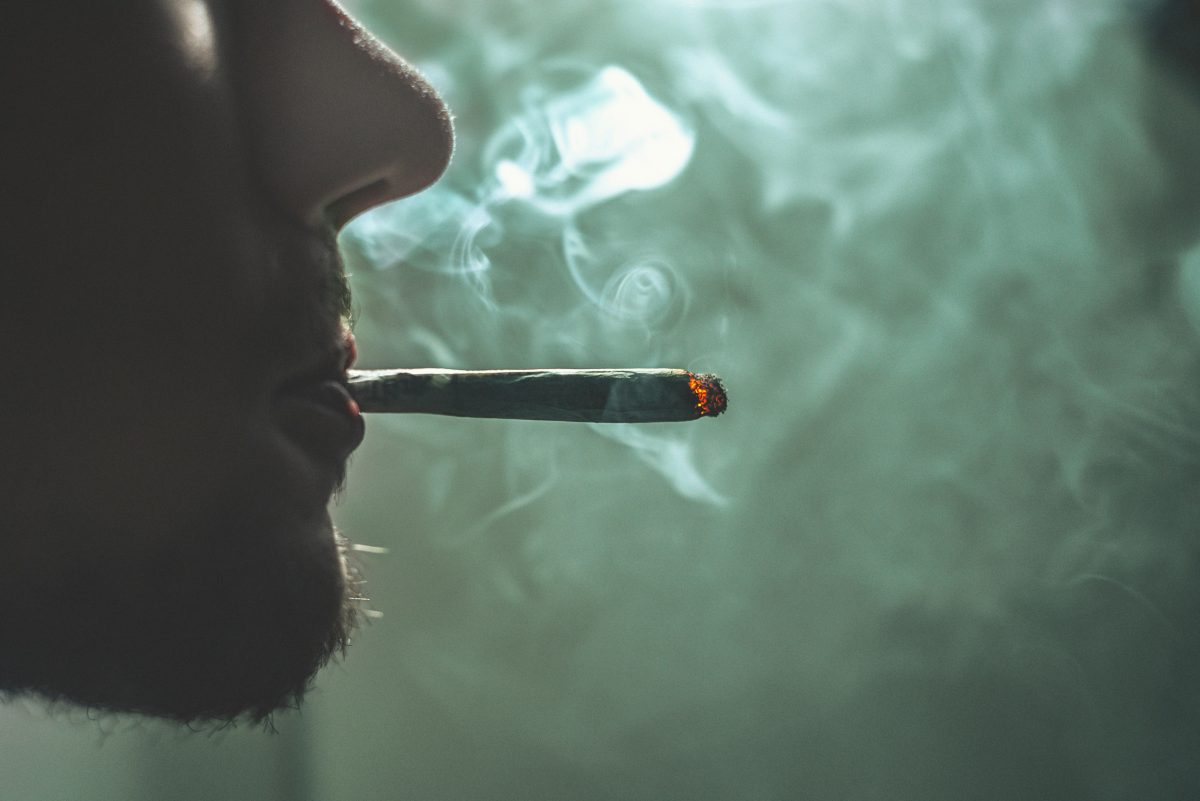 man smoking weed - Smoking Club Opening License