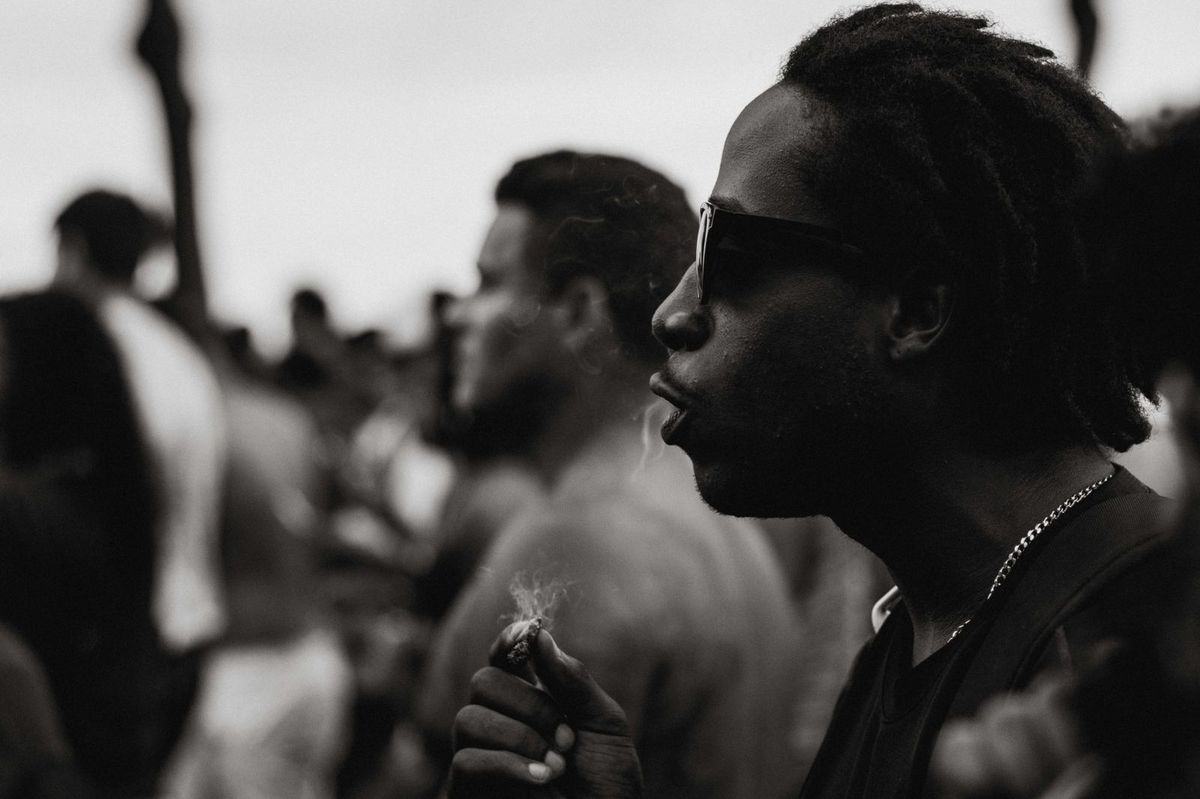 people smoking in party - Cannabis Social Club