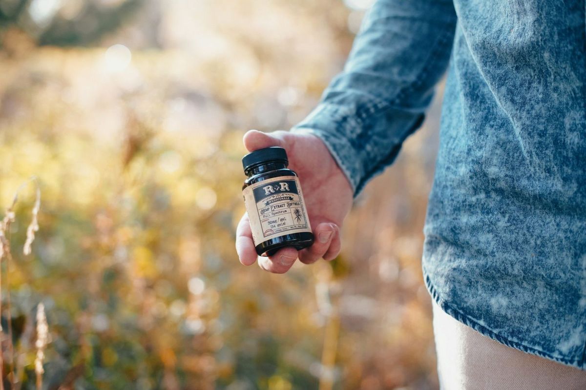 Person Holding CBD - Cannabis Portugal