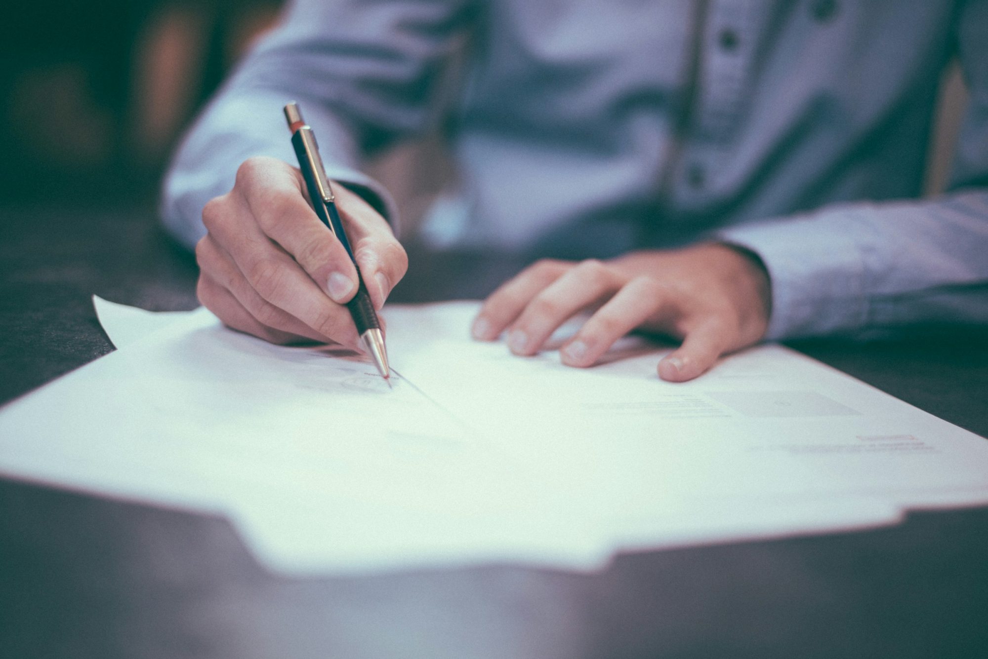 Person Signing - Cannabis Farming in Uruguay