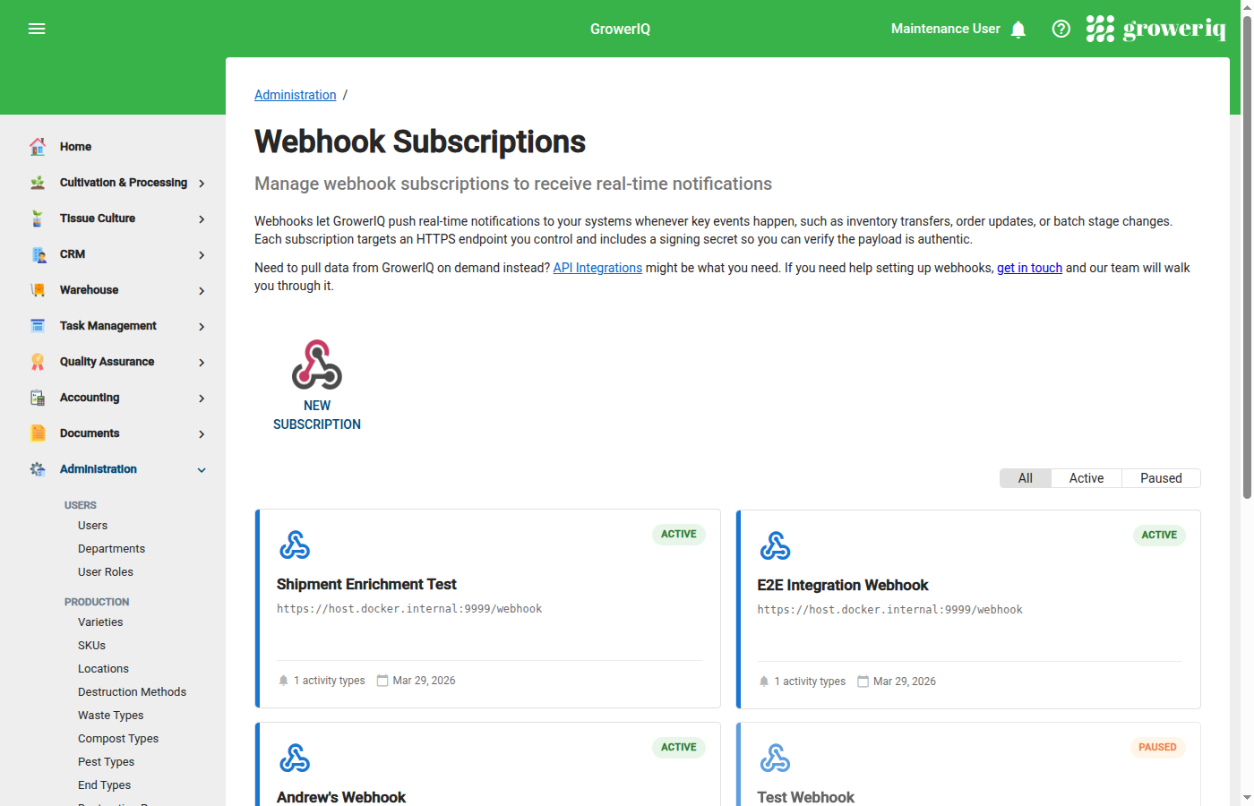 Webhook subscriptions page showing active and paused webhook cards